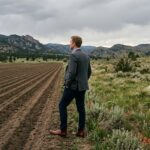 Dyslexia, ADHD, and the Entrepreneurial Edge: Why Different Thinkers Often Win in Business Man standing between the wilds and a cultivated field
