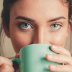 Green Eyed Girl Drinking Coffee