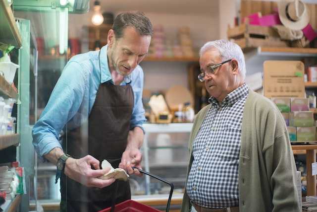 Business Owner helping a customer