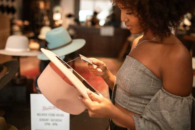 Woman looking at price tag