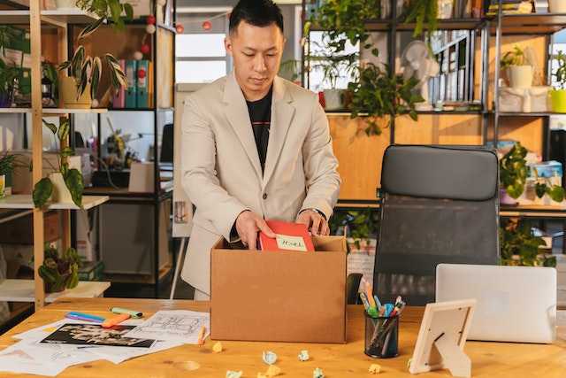 Man packing up desk