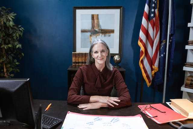 Woman boss sitting at a table