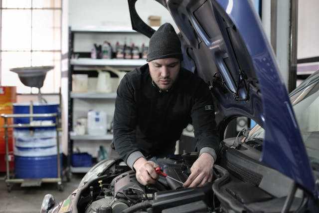 Can Mechanic working on a car